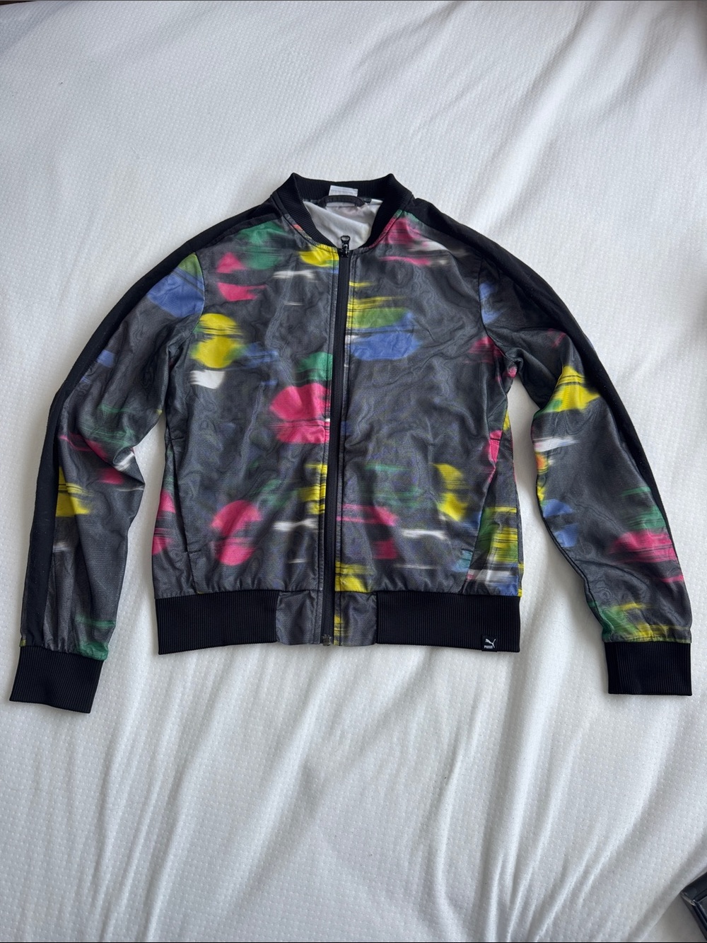 Puma Black Jacket with Pink Yellow Blue and Green Abstract Print